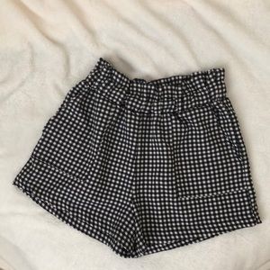 Black and white checkered paper bag shorts